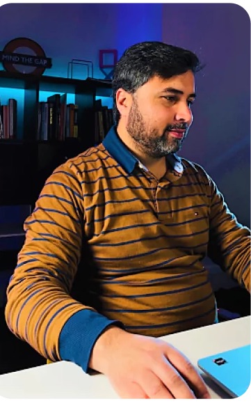 A designer at a laptop