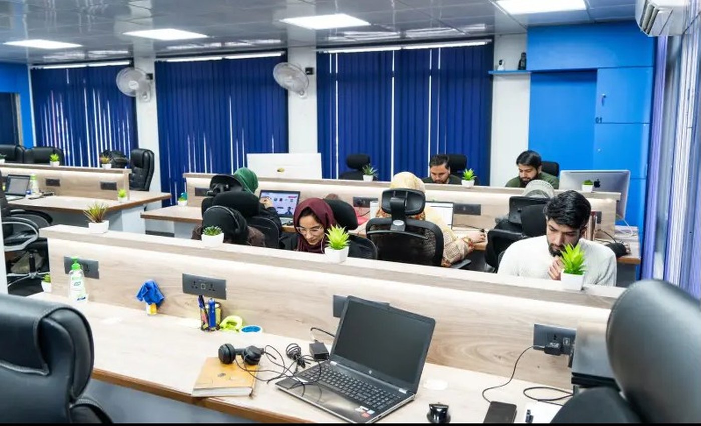 The Apexure delivery team at their desks